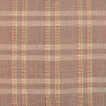 Handwoven fabric detail in a subtle window pane plaid in shades of red, pink sage green and cream. 