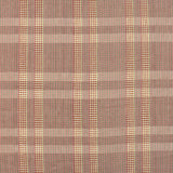 Handwoven fabric detail in a subtle window pane plaid in shades of red, pink sage green and cream. 