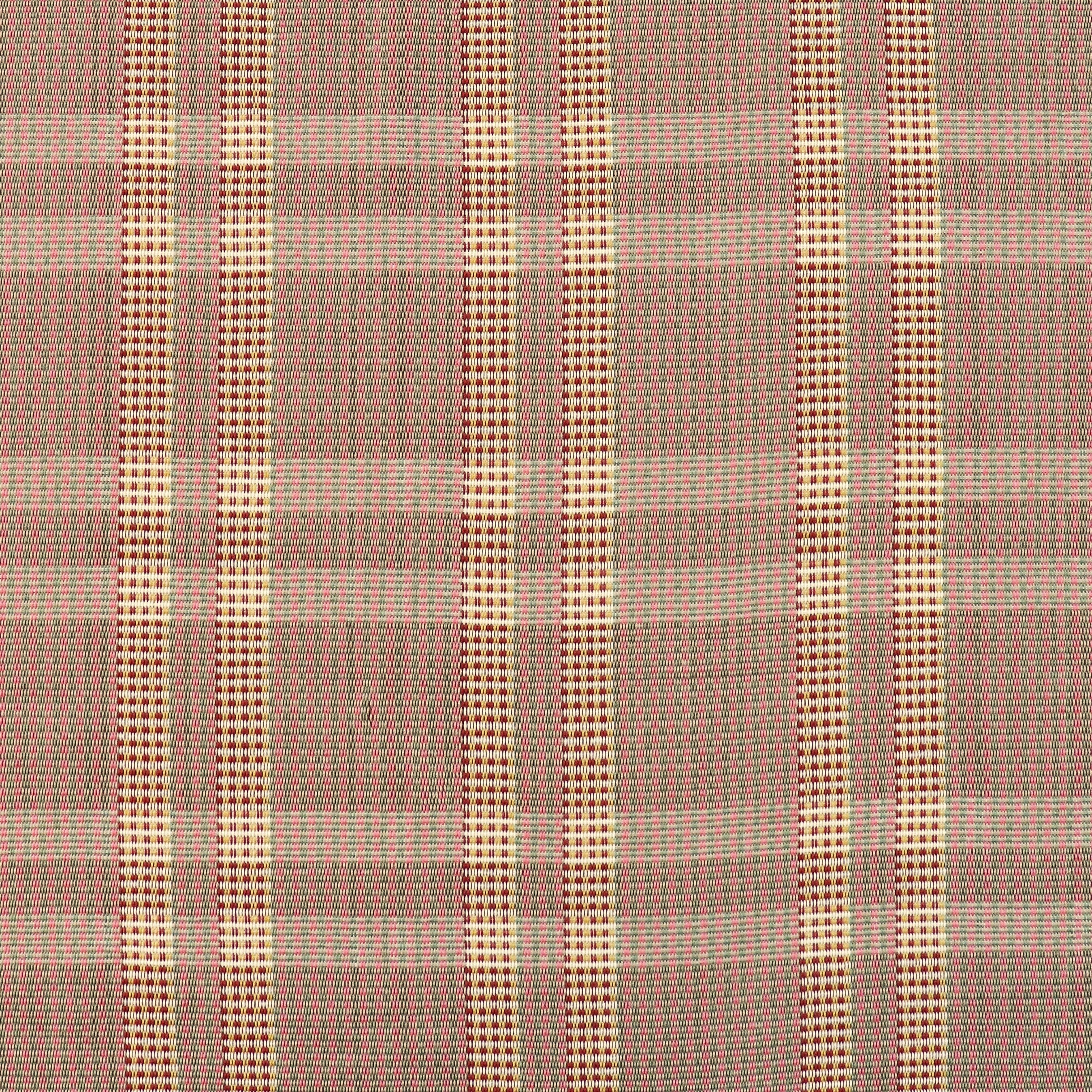 Handwoven fabric detail in a subtle window pane plaid in shades of red, pink sage green and cream. 