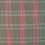 Handwoven fabric detail in a subtle window pane plaid in shades of red, pink, brown and cream. 