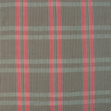 Handwoven fabric detail in a subtle window pane plaid in shades of red, pink, brown and cream. 