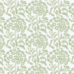 Wallpaper pattern with a detailed floral pattern in green on white. 