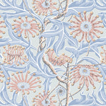 Wallpaper in a complex botanical floral design in pink, soft shades of blue with a yellow accent. 