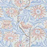 Wallpaper in a complex botanical floral design in pink, soft shades of blue with a yellow accent. 