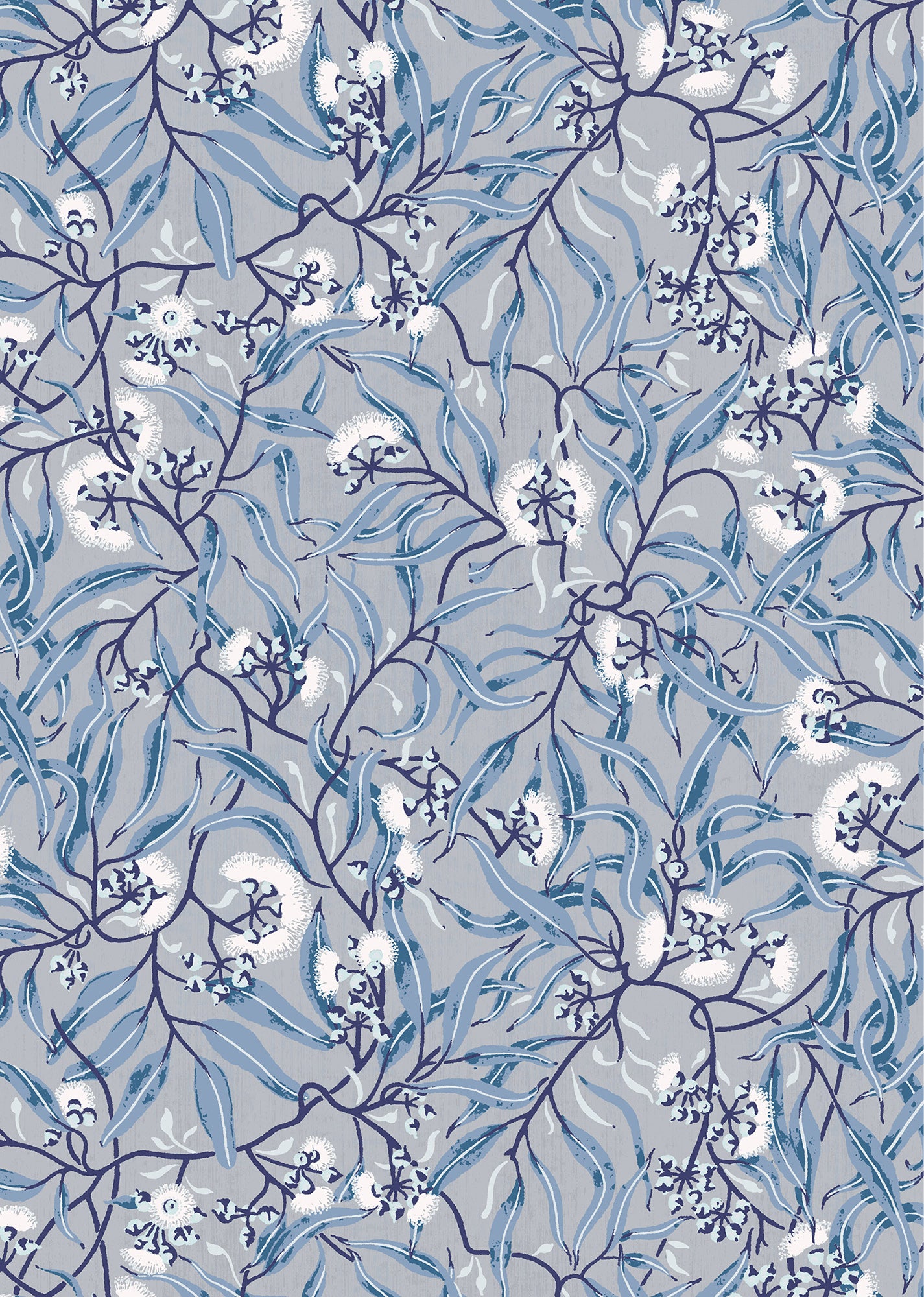 Wallpaper in a climbing vine floral design in tonal shades of blue and white. 