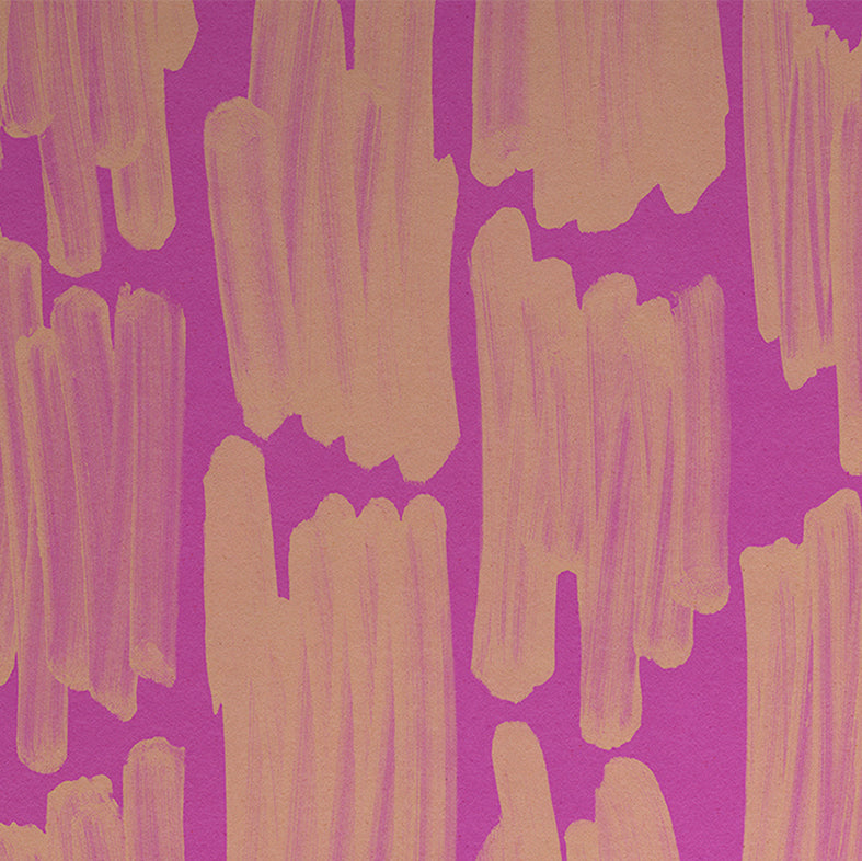 Detail of wallpaper in an abstract paint swatch print in orange on a pink field.