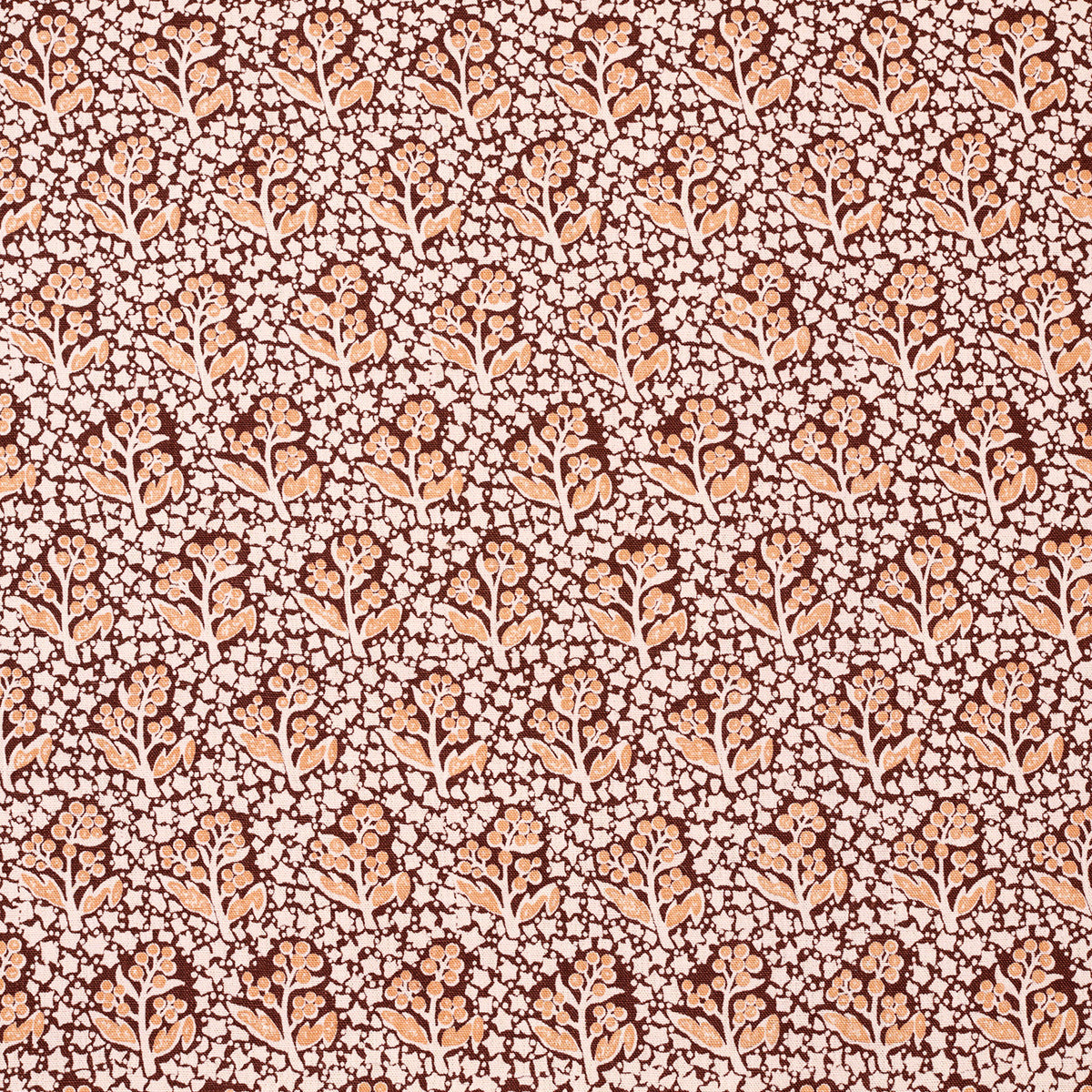 Patterned fabric with small floral design on a brown background