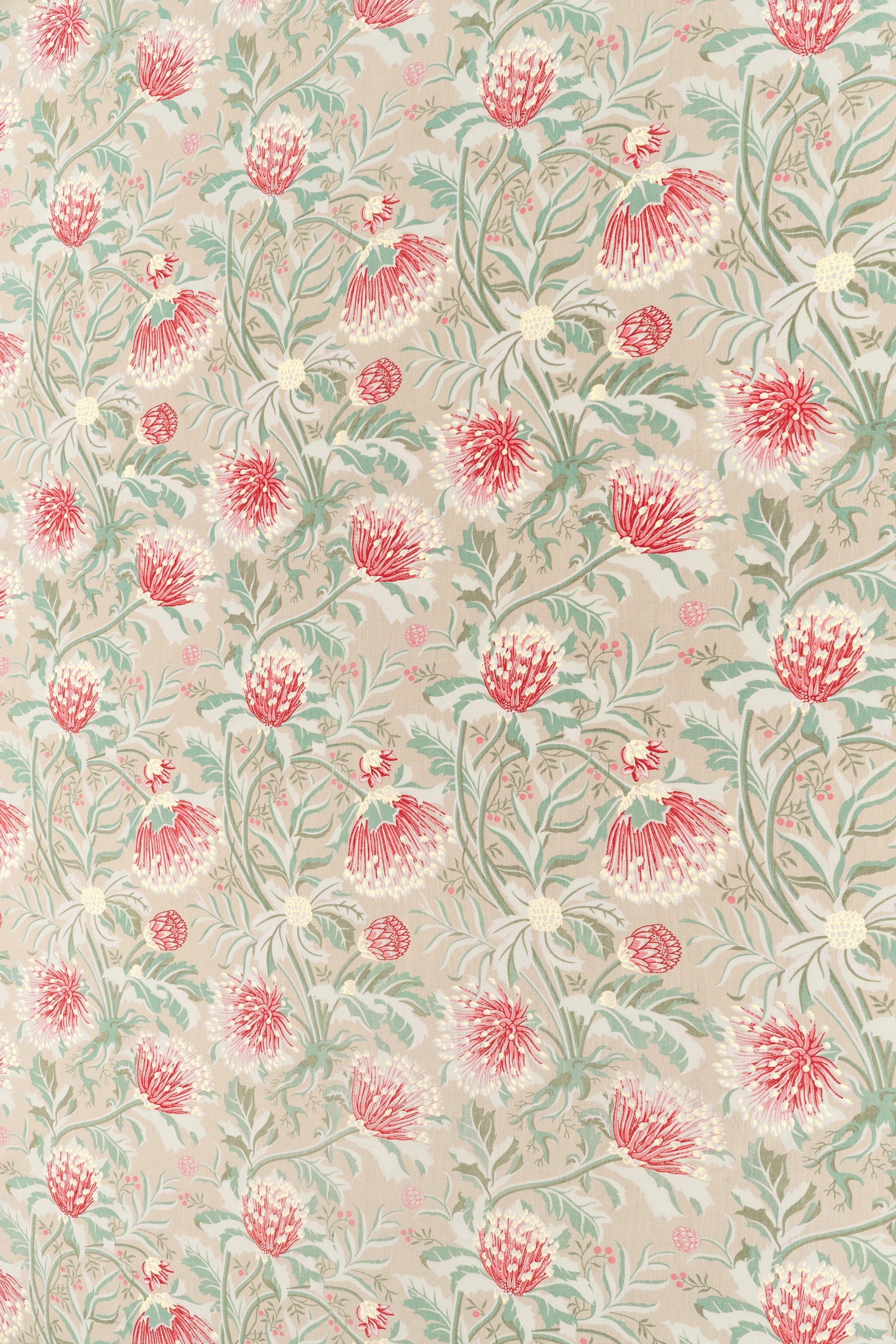 Printed fabric in a lush floral botanical design in red, pink, yellow green and turquoise on a tan field. 