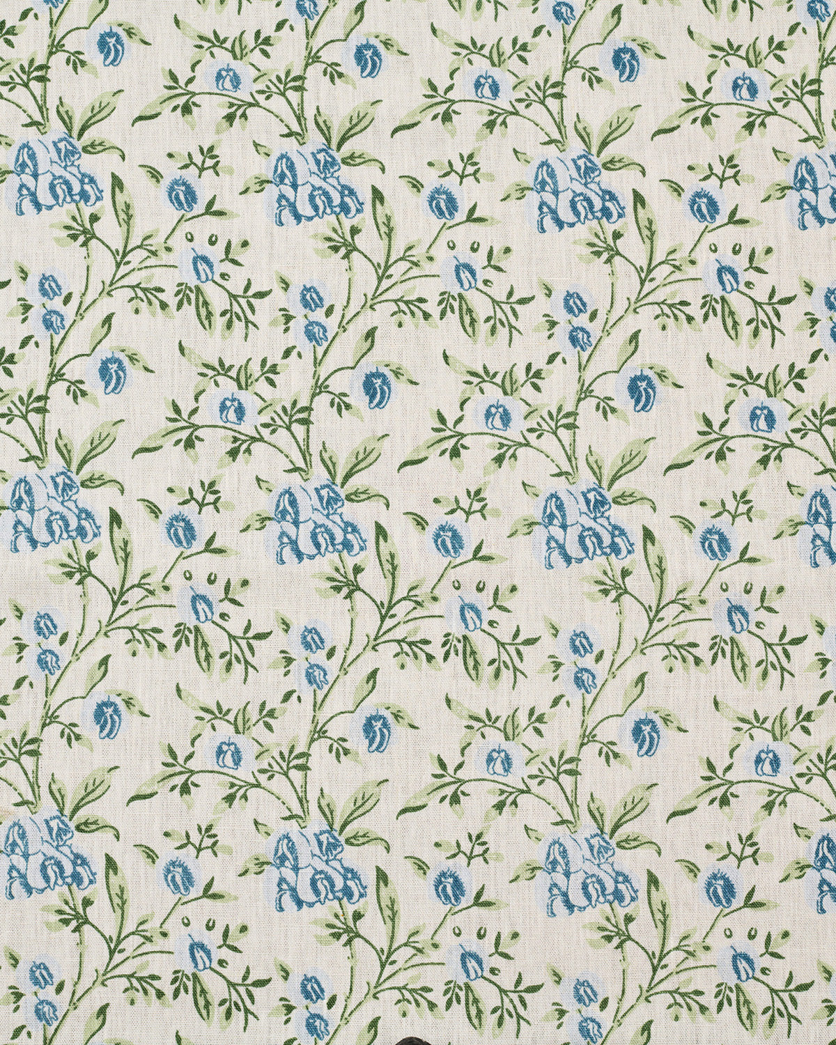 Floral pattern with blue flowers and green leaves on a cream background
