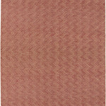 Red textured rug with a geometric pattern