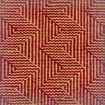 Patterned carpet with a zigzag design in red and beige.