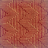 Patterned carpet with a zigzag design in red and beige.