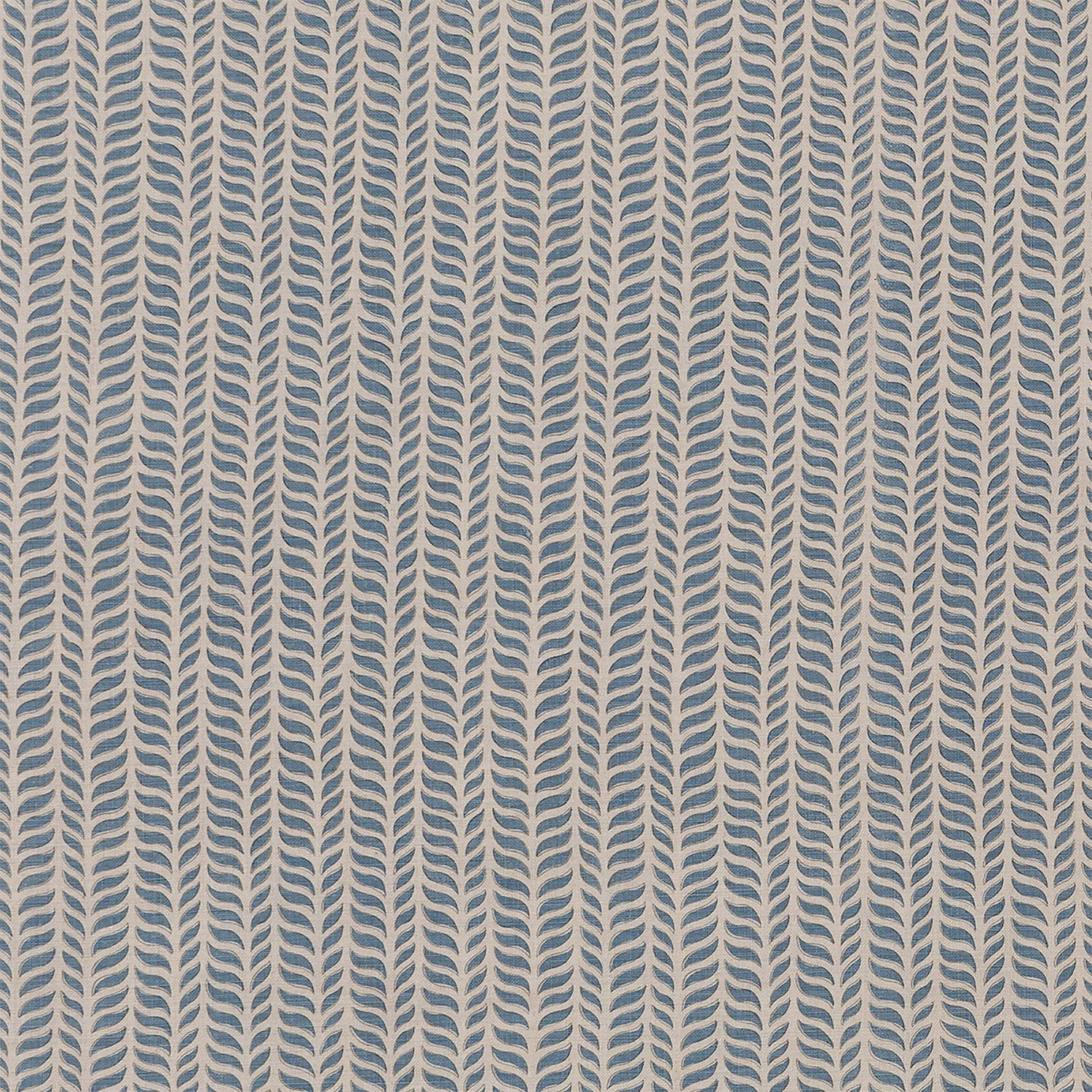 Fabric in a painterly herringbone print in blue and brown on a tan field.