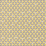 Fabric in a geometric grid print in shades of yellow and brown on a cream field.