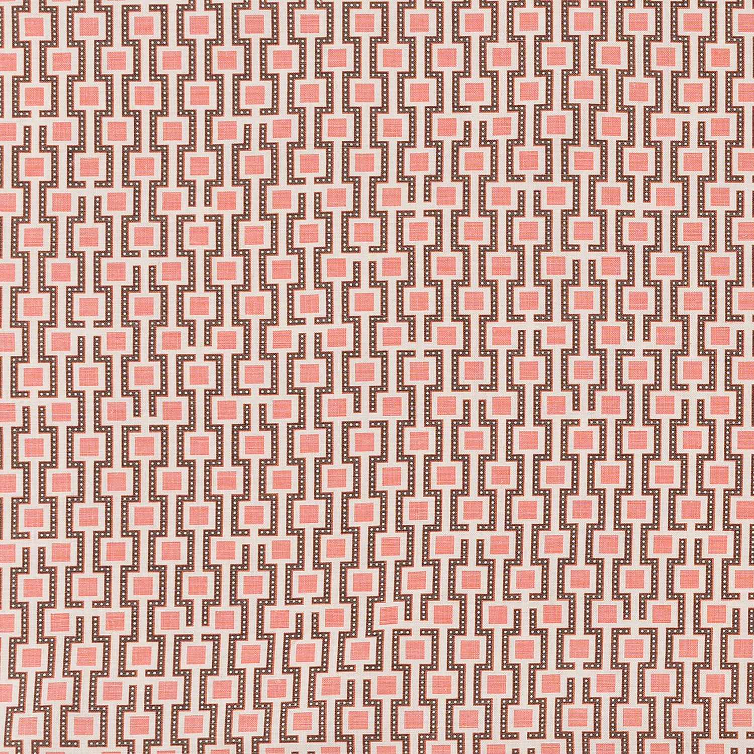 Fabric in a geometric grid print in shades of pink and brown on a tan field.