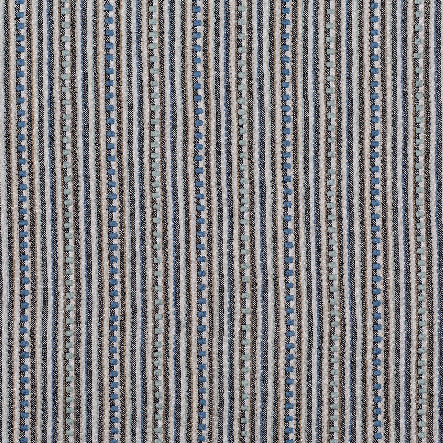 Dimensional embroidered fabric in an irregular stripe pattern in shades of blue, grey and tan.