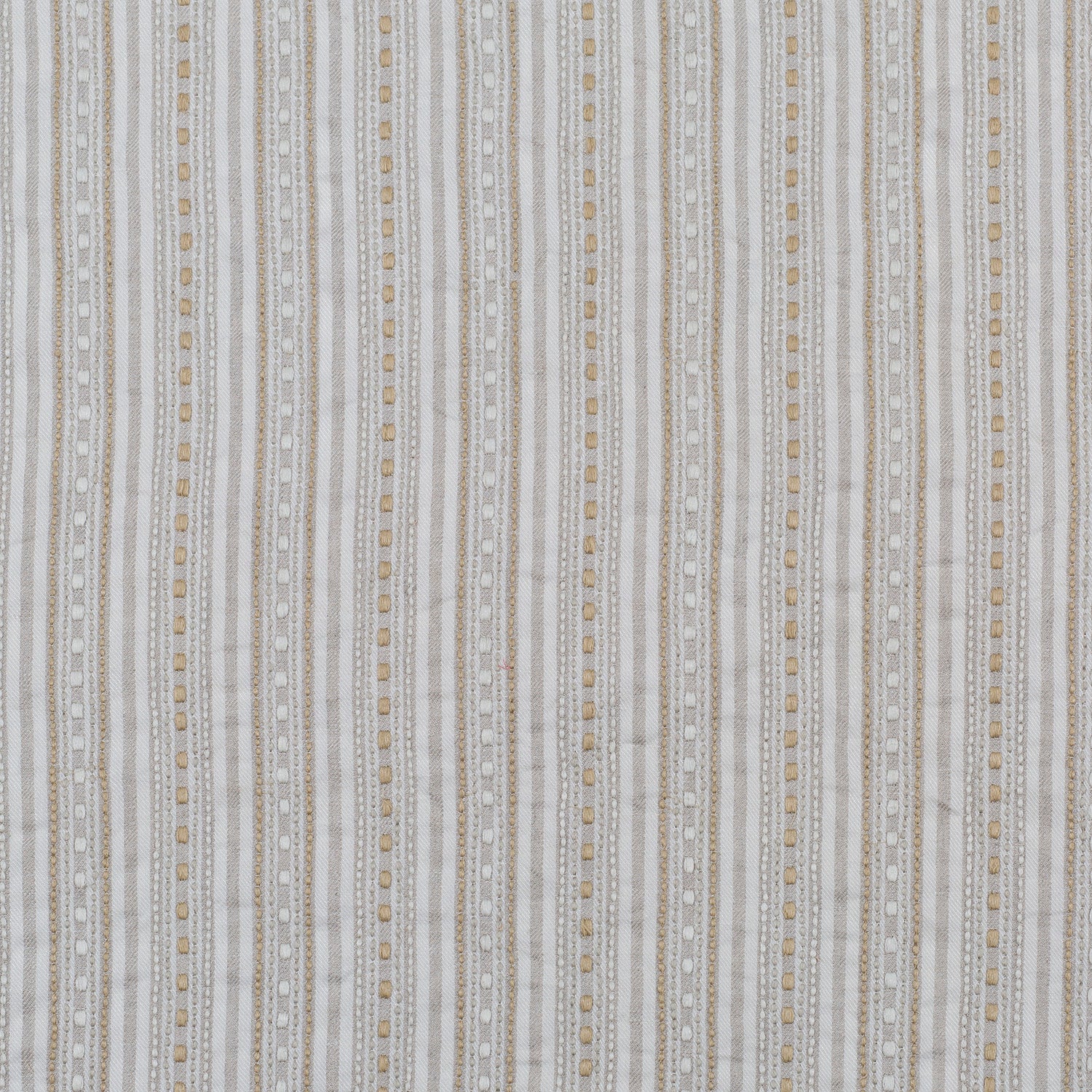 Dimensional embroidered fabric in an irregular stripe pattern in shades of gray, white and cream.