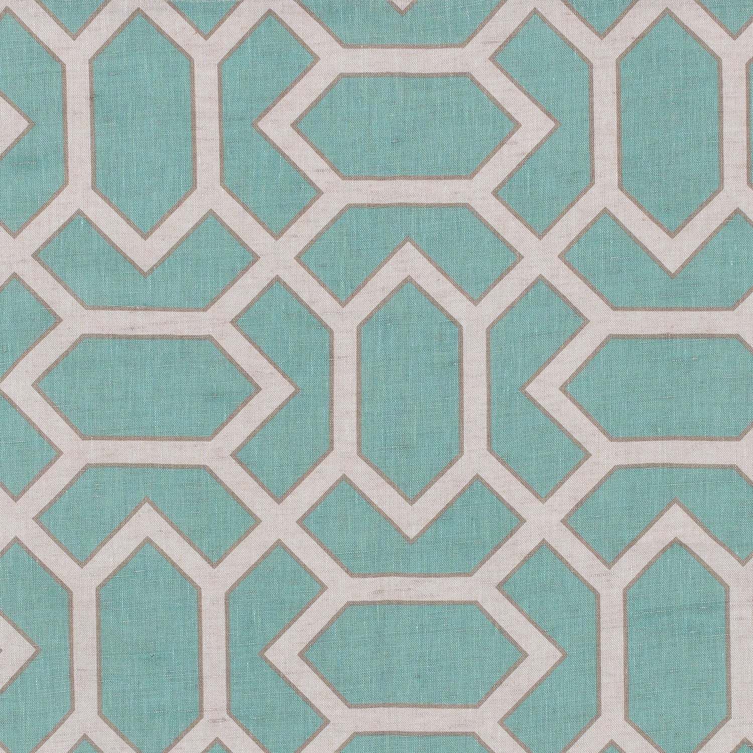 Fabric in a geometric lattice print in cream and gray on a turquoise field.