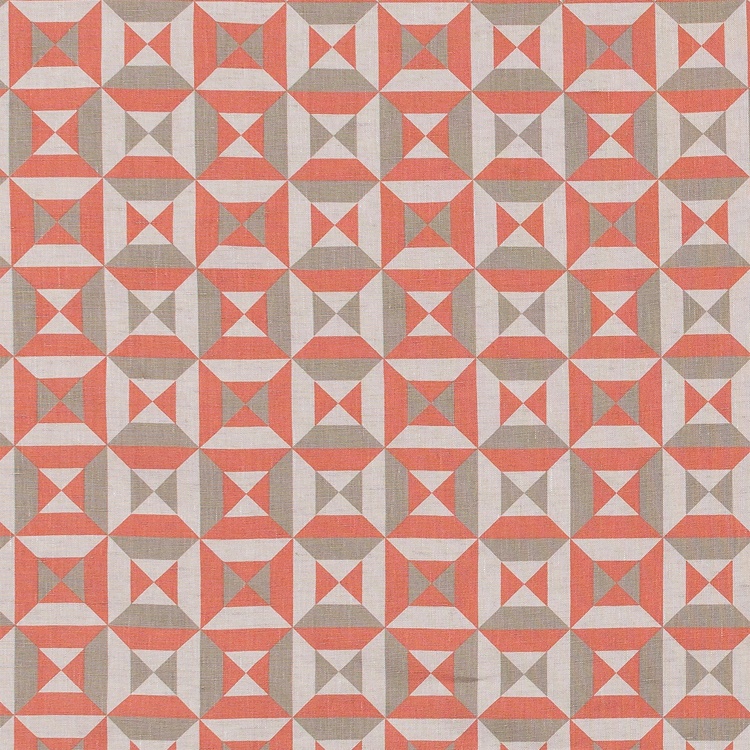 Fabric in a geometric grid print in cream, gray and coral.