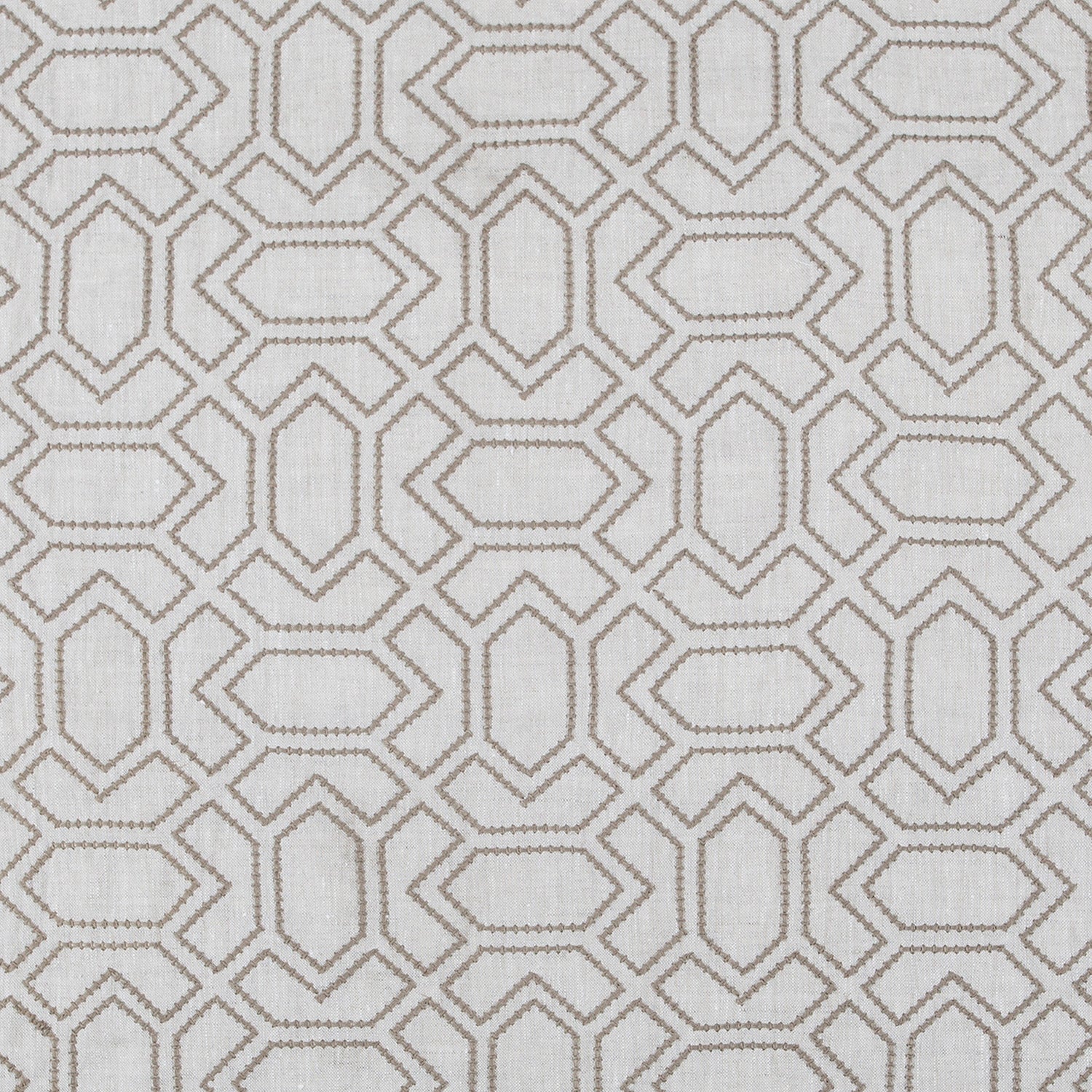 Fabric with an embroidered geometric grid print in brown on a light gray field.