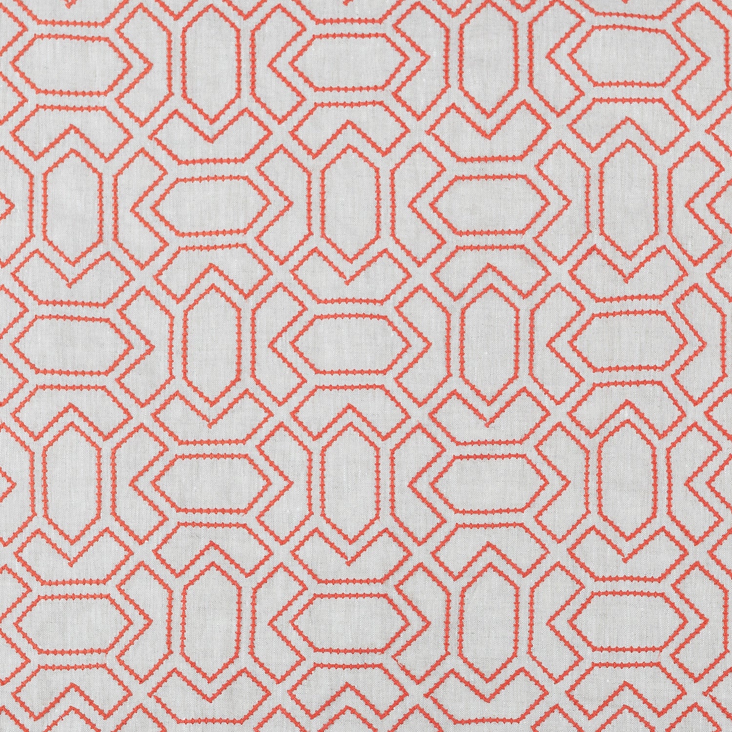 Fabric with an embroidered geometric grid print in coral on a light gray field.