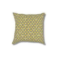 Square throw pillow with a repeating geometric square and line pattern in yellow and black on a cream field.