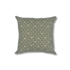 Square throw pillow with a repeating geometric square and line pattern in olive and black on a cream field.