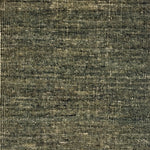 Textured green handwoven rug