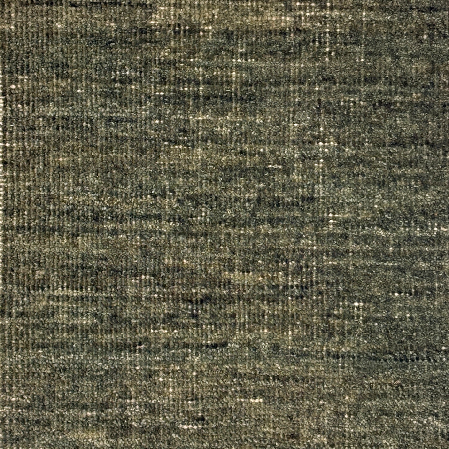 Textured green handwoven rug