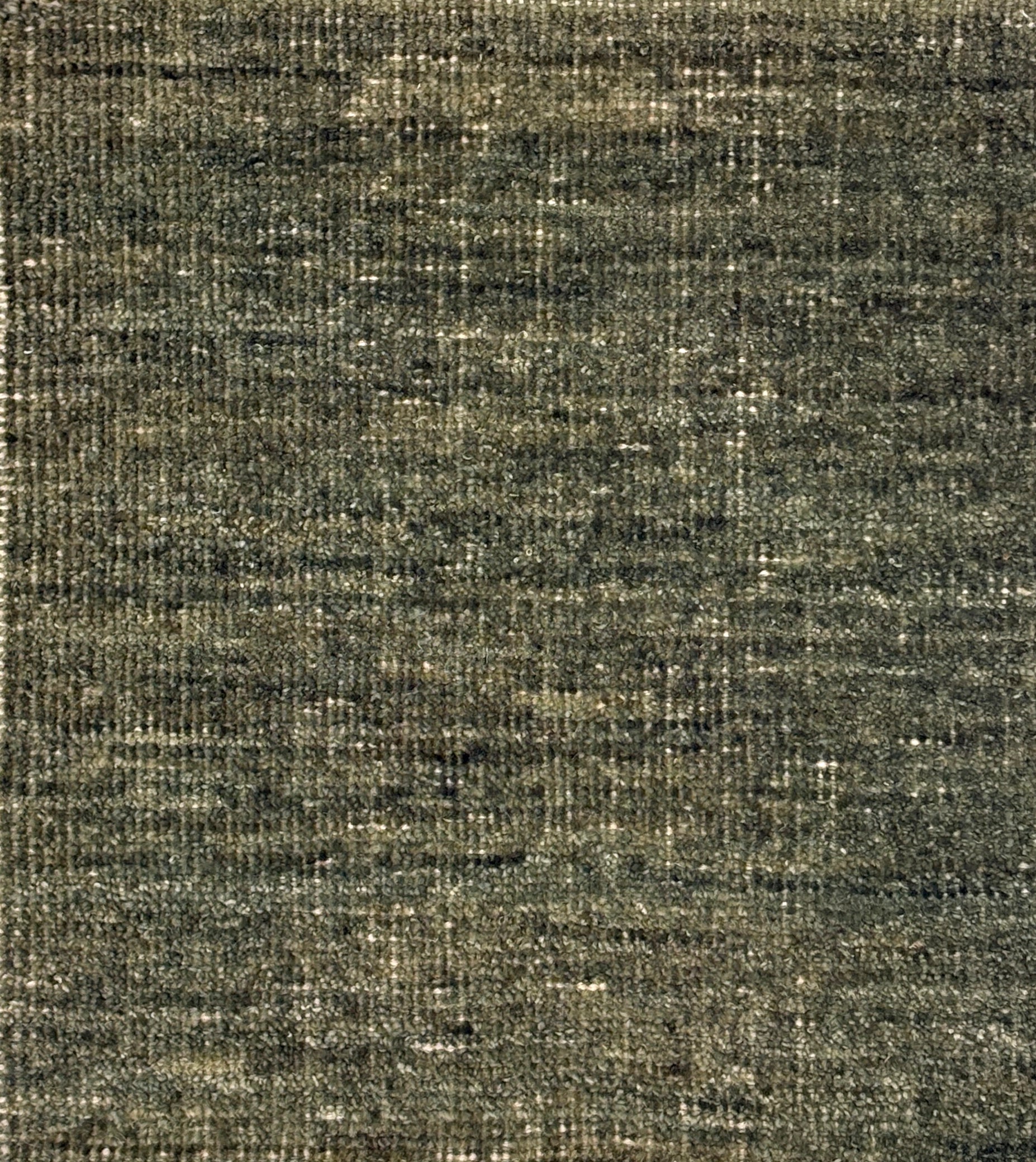 Textured green handwoven rug