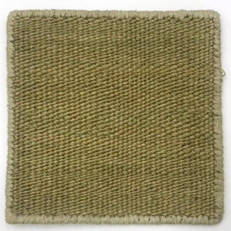 Flatweave dhurrie sample on white in light green