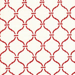 Detail of fabric in a curvilinear lattice print in red on a white field.