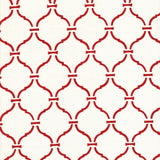 Detail of fabric in a curvilinear lattice print in red on a white field.