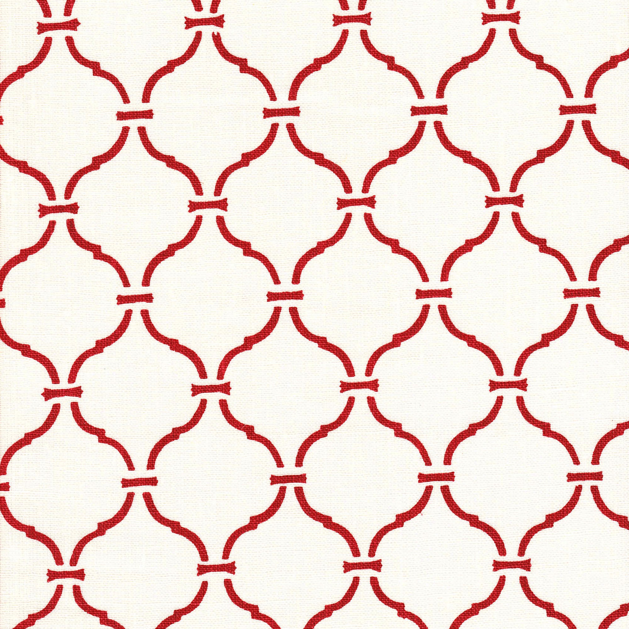 Detail of fabric in a curvilinear lattice print in red on a white field.