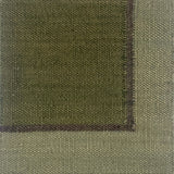 Close up of a flatweave rug in green with a brown and grey border. 