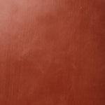 Detail of wallpaper in a glossy red-brown leather.