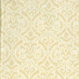 Detail of fabric in a botanical damask print in tan on a cream field.