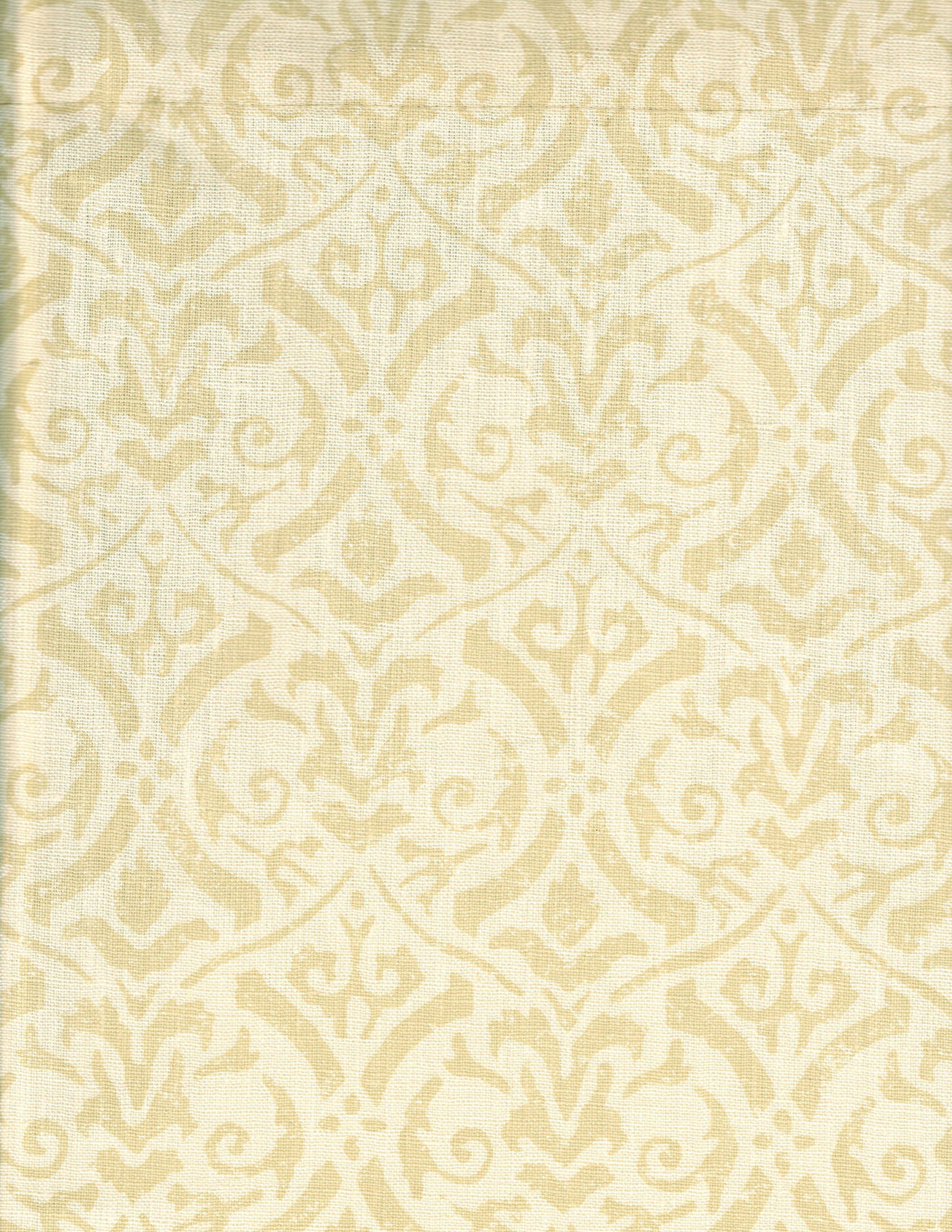 Detail of fabric in a botanical damask print in tan on a cream field.