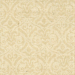 Detail of fabric in a botanical damask print in tan on a cream field.