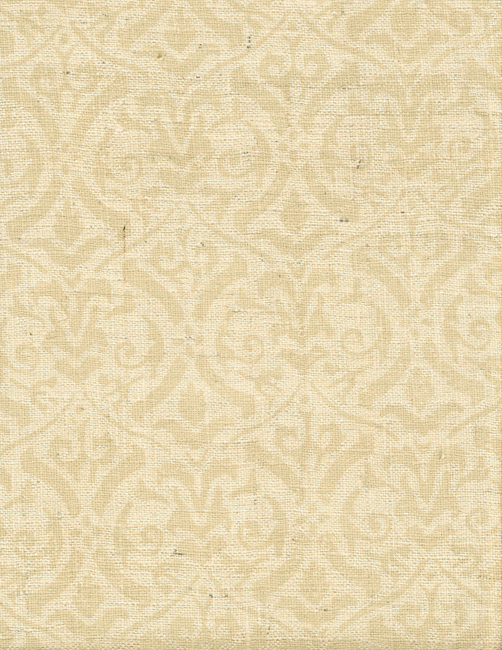 Detail of fabric in a botanical damask print in tan on a cream field.