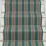 Striped flatweave runner in blue and grey on white staircase