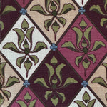 Patterned fabric with green and purple floral design in a lattice design. 