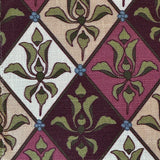 Patterned fabric with green and purple floral design in a lattice design. 
