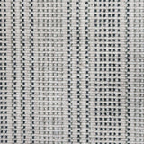 Broadloom carpet in dashed stripe pattern in shades of dark green with cream. 