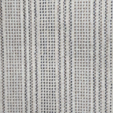 Broadloom carpet in dashed stripe pattern in shades of brown and grey with cream. 