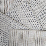 Broadloom carpet samples in a stripe pattern in a range of neutral colors. 