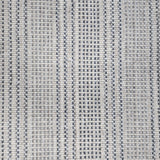 Broadloom carpet in dashed stripe pattern in shades of blue and grey with cream. 