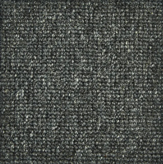 Broadloom carpet swatch in a textured pattern in a dark grey design