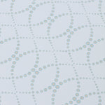 Detail of a wallpaper in a playful floral lattice print in aqua blue and tan on a white field.