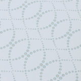 Detail of a wallpaper in a playful floral lattice print in aqua blue and tan on a white field.